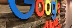 Google logo on a wood wall